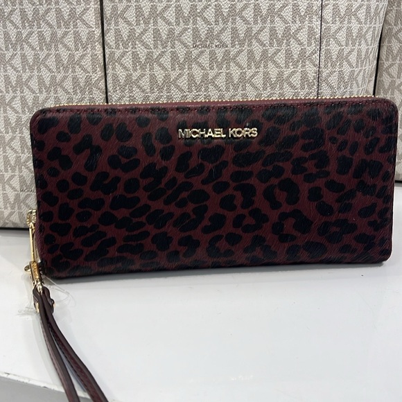 MICHAEL KORS
Leather Lg Continental Wristlet Case Wallet Exotic Print Hair Culf - Picture 15 of 16
